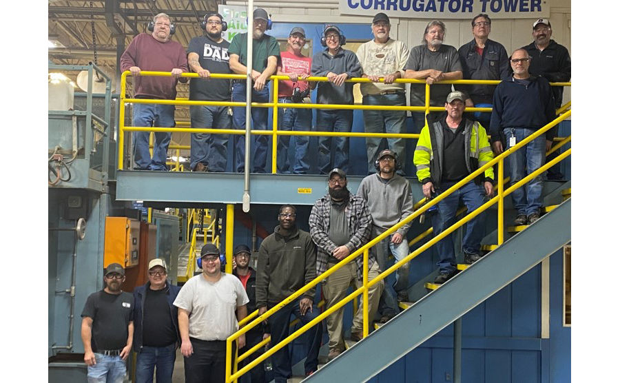 The Owosso team as they celebrated the corrugator milestone taken during the last shift change for the machine. 